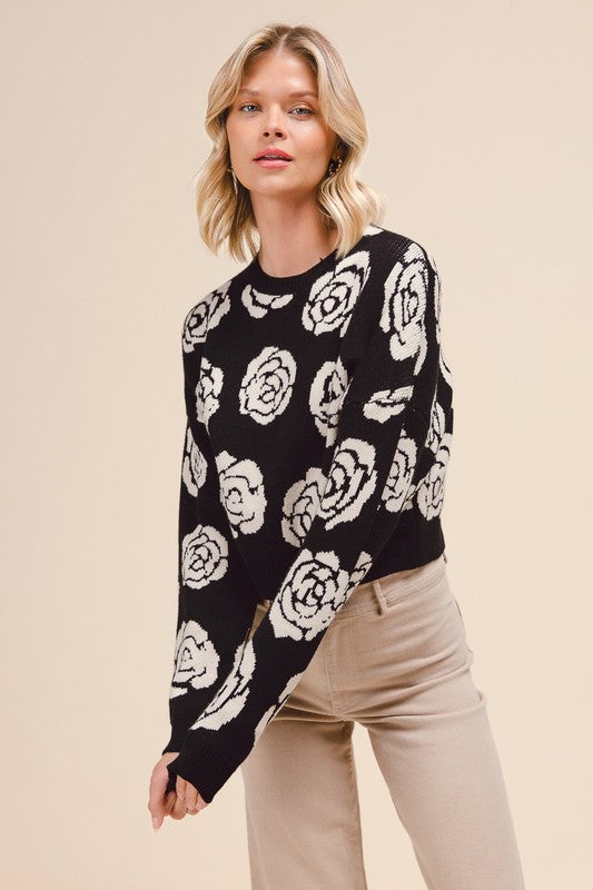 Black sweater with white flowers