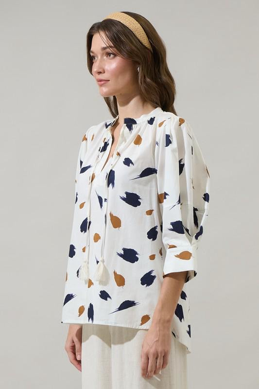 Ivory with abstract print navy & camel top