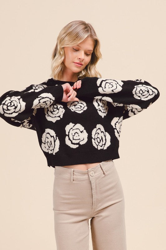 Black sweater with white flowers