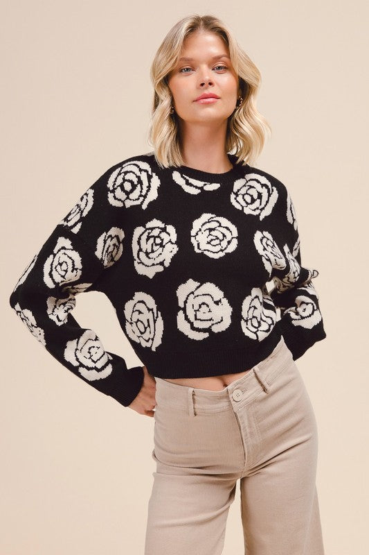 Black sweater with white flowers