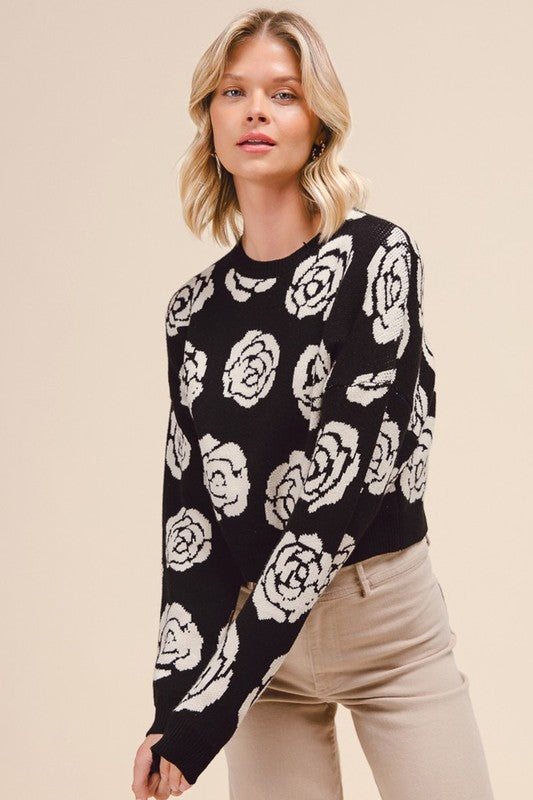 Black sweater with white flowers