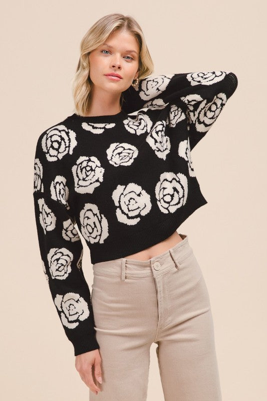 Black sweater with white flowers