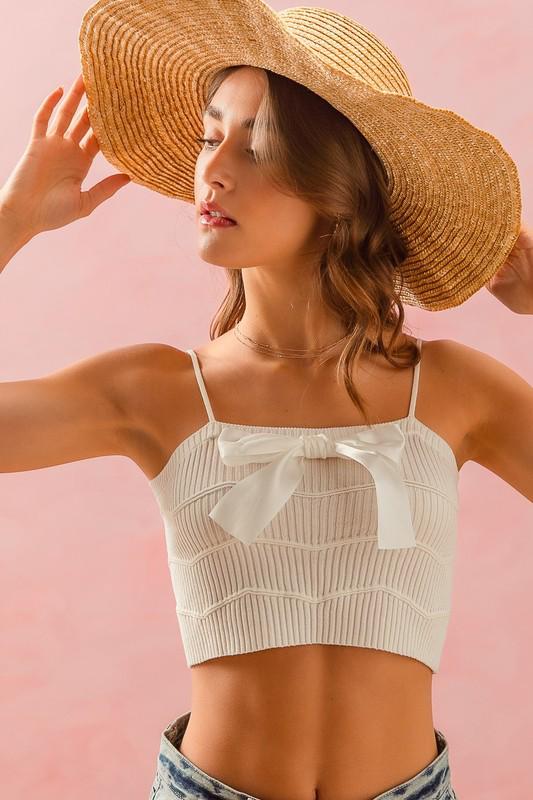 White sweater bow top