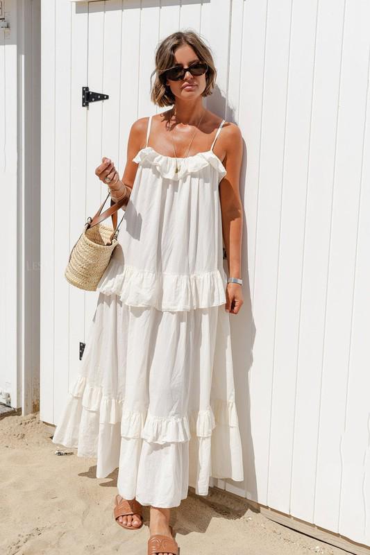 Ruffled hem flowing white maxi dress