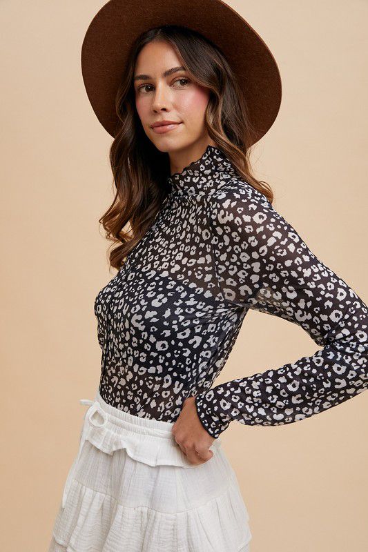 Animal print mesh mock neck top