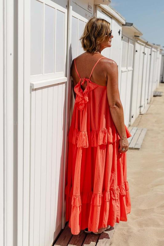 Ruffled hem flowing coral maxi dress